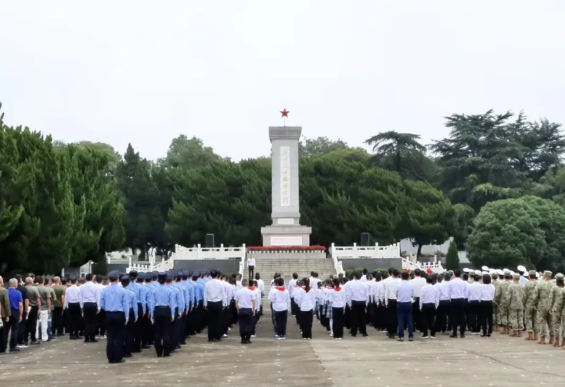 我区举行向革命烈士敬献花篮仪式